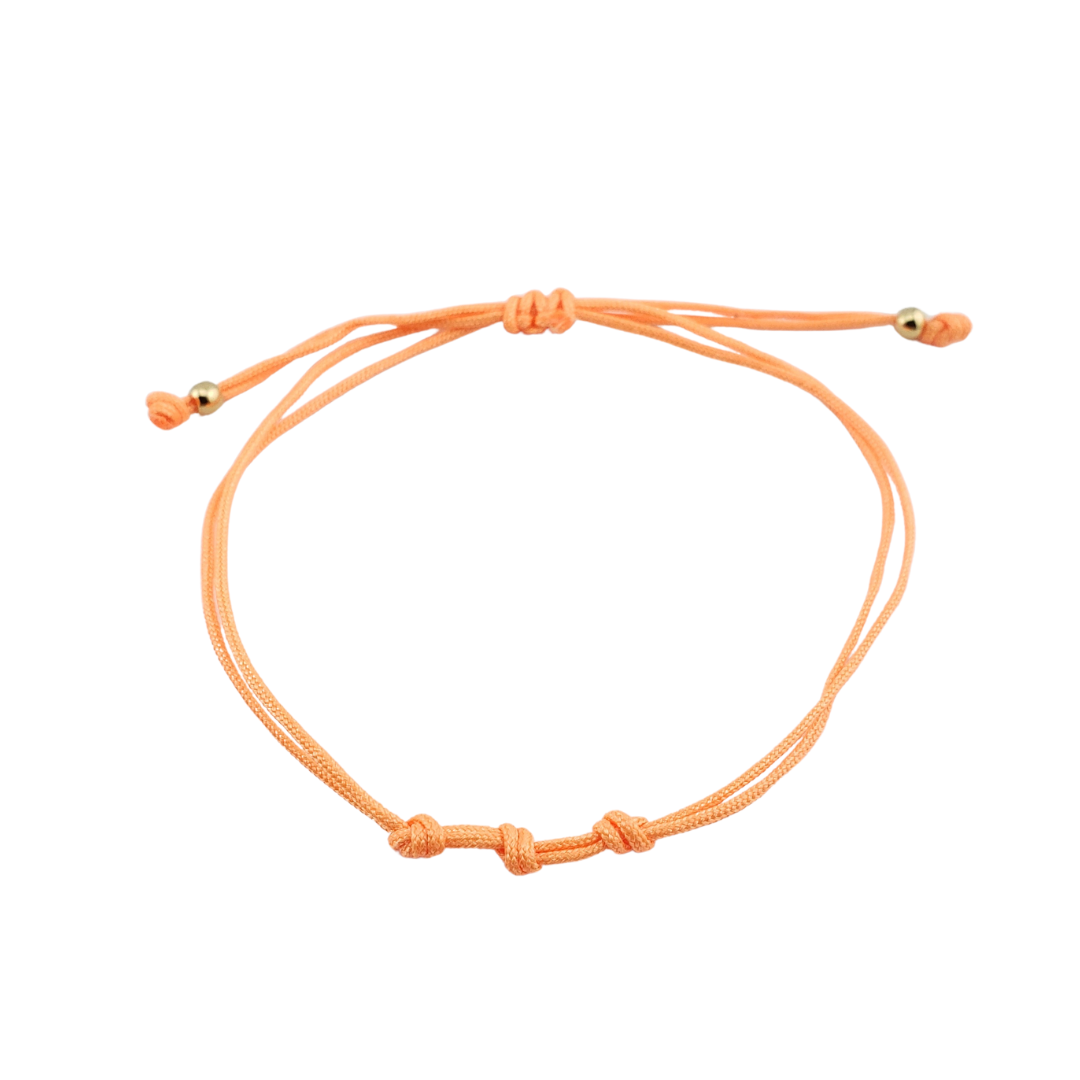 Pulseras hilos y 2 bolitas