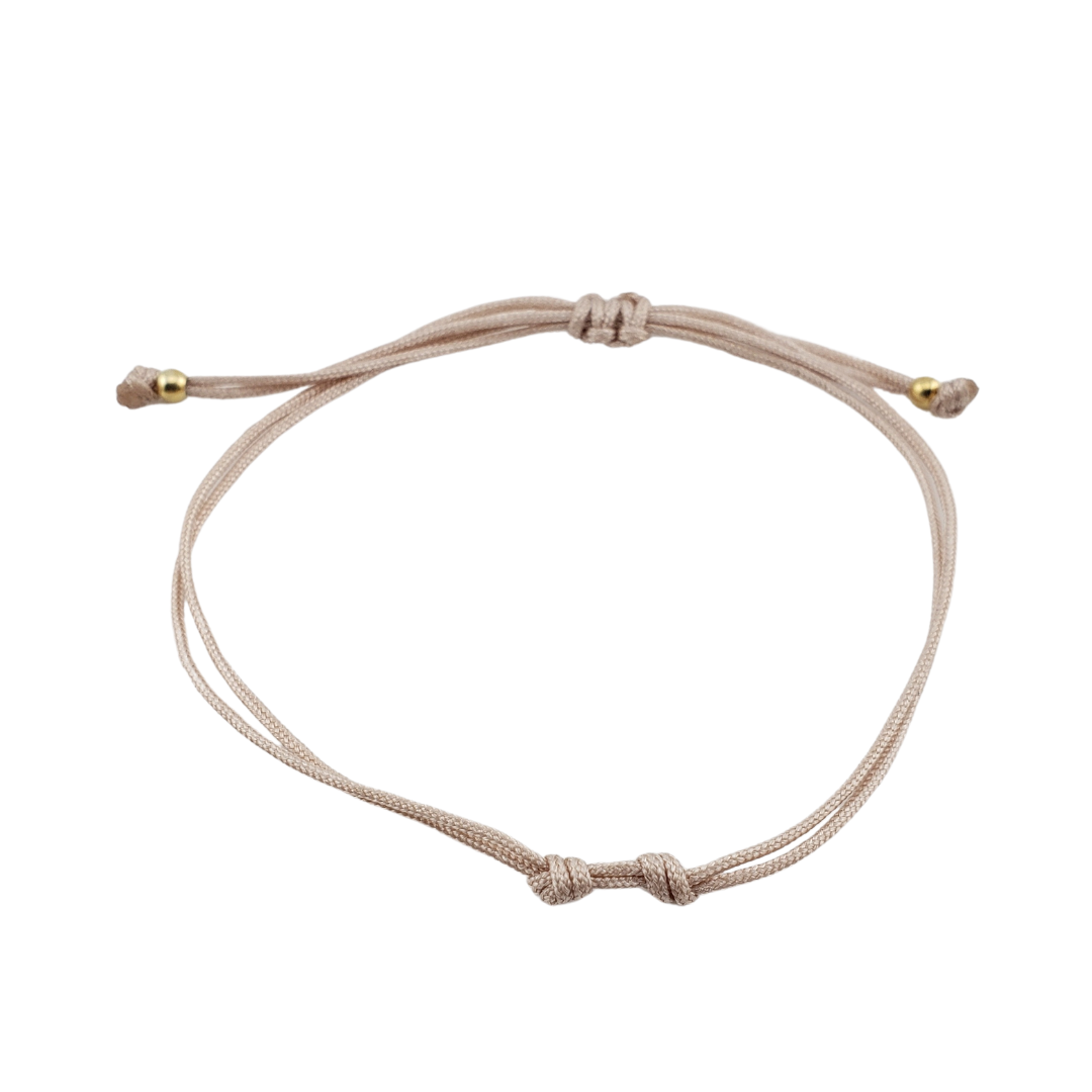 Pulseras hilos y 2 bolitas