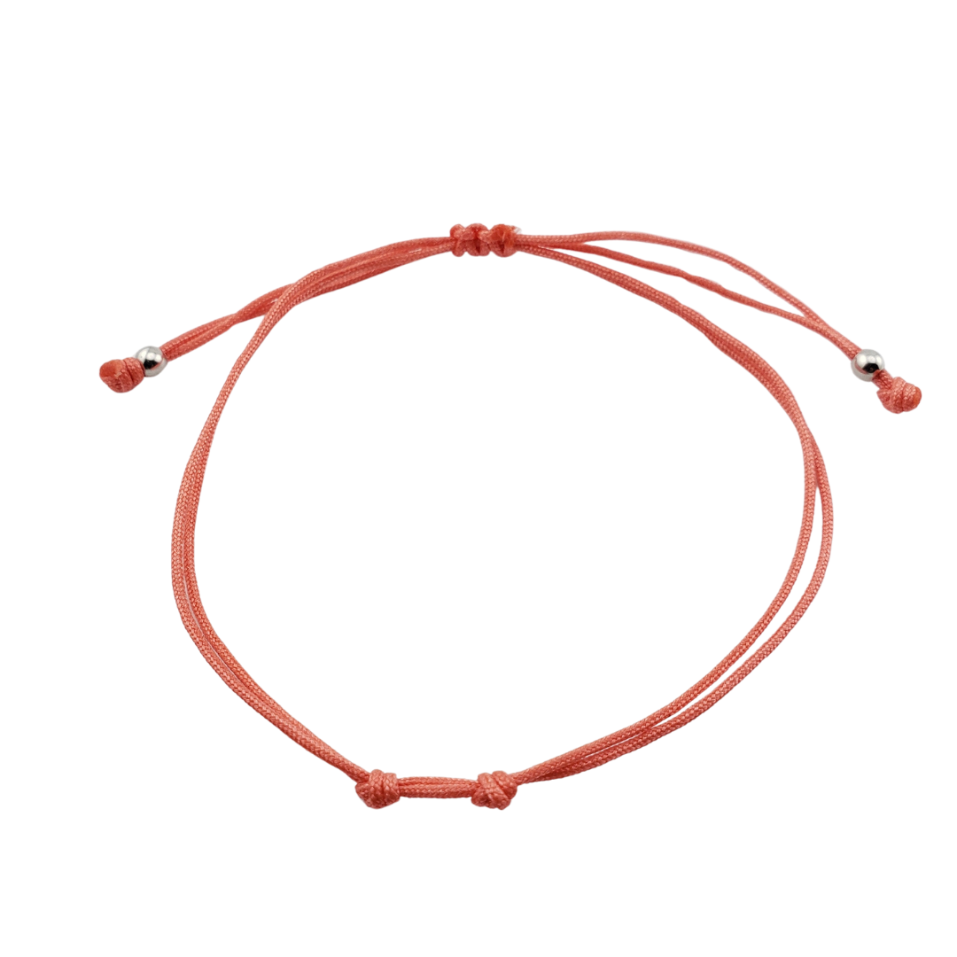 Pulseras hilos y 2 bolitas