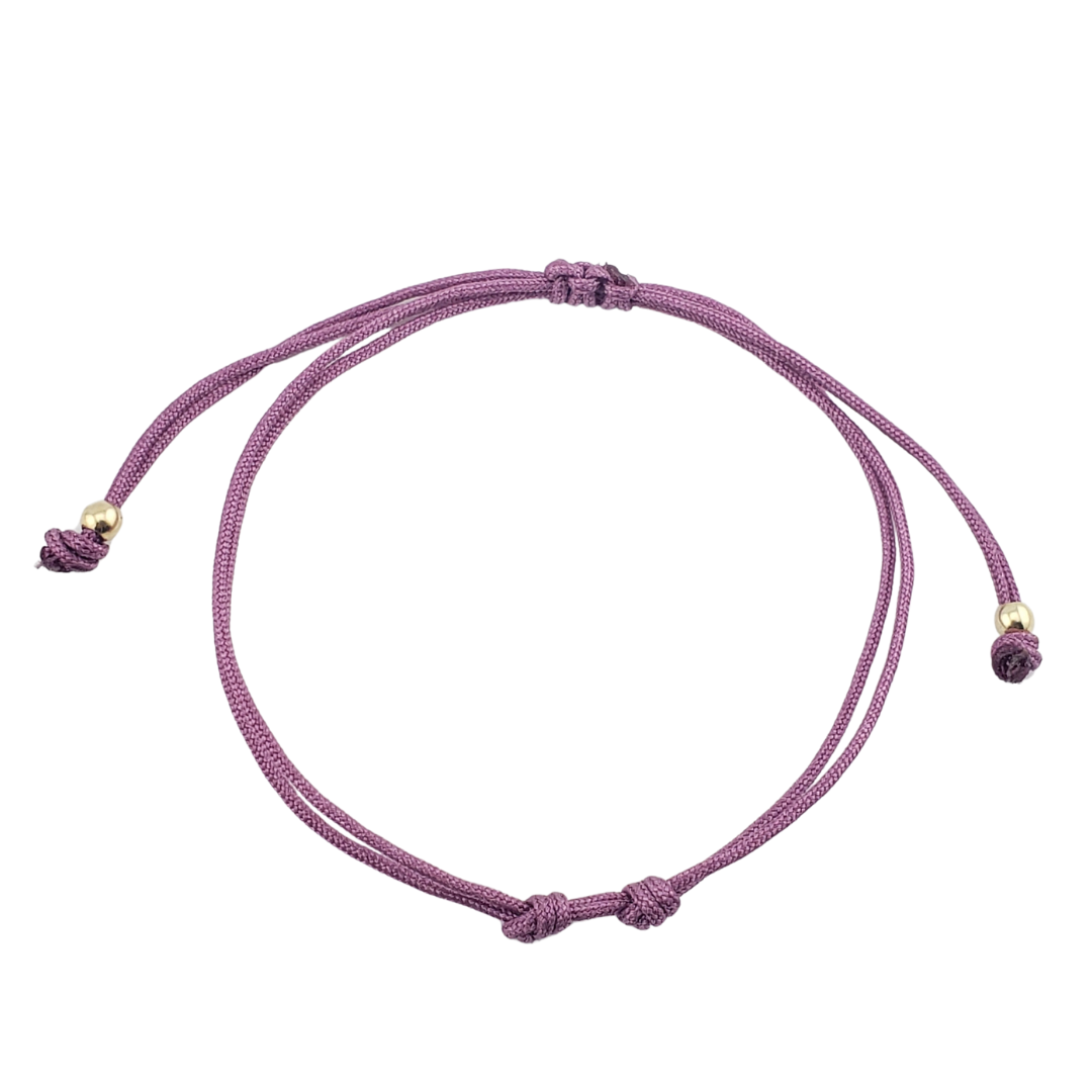 Pulseras hilos y 2 bolitas