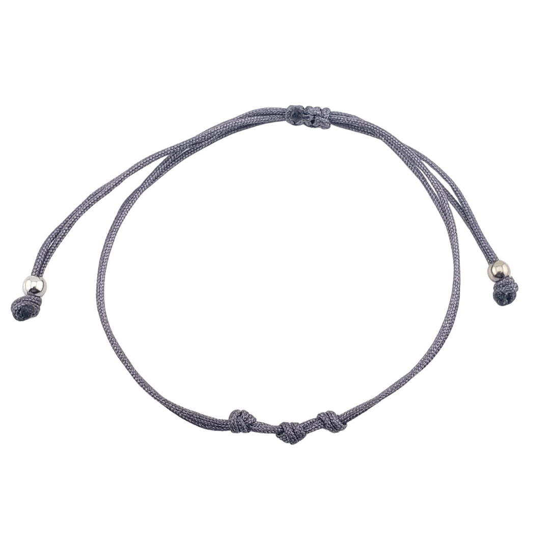 Pulseras hilos y 2 bolitas