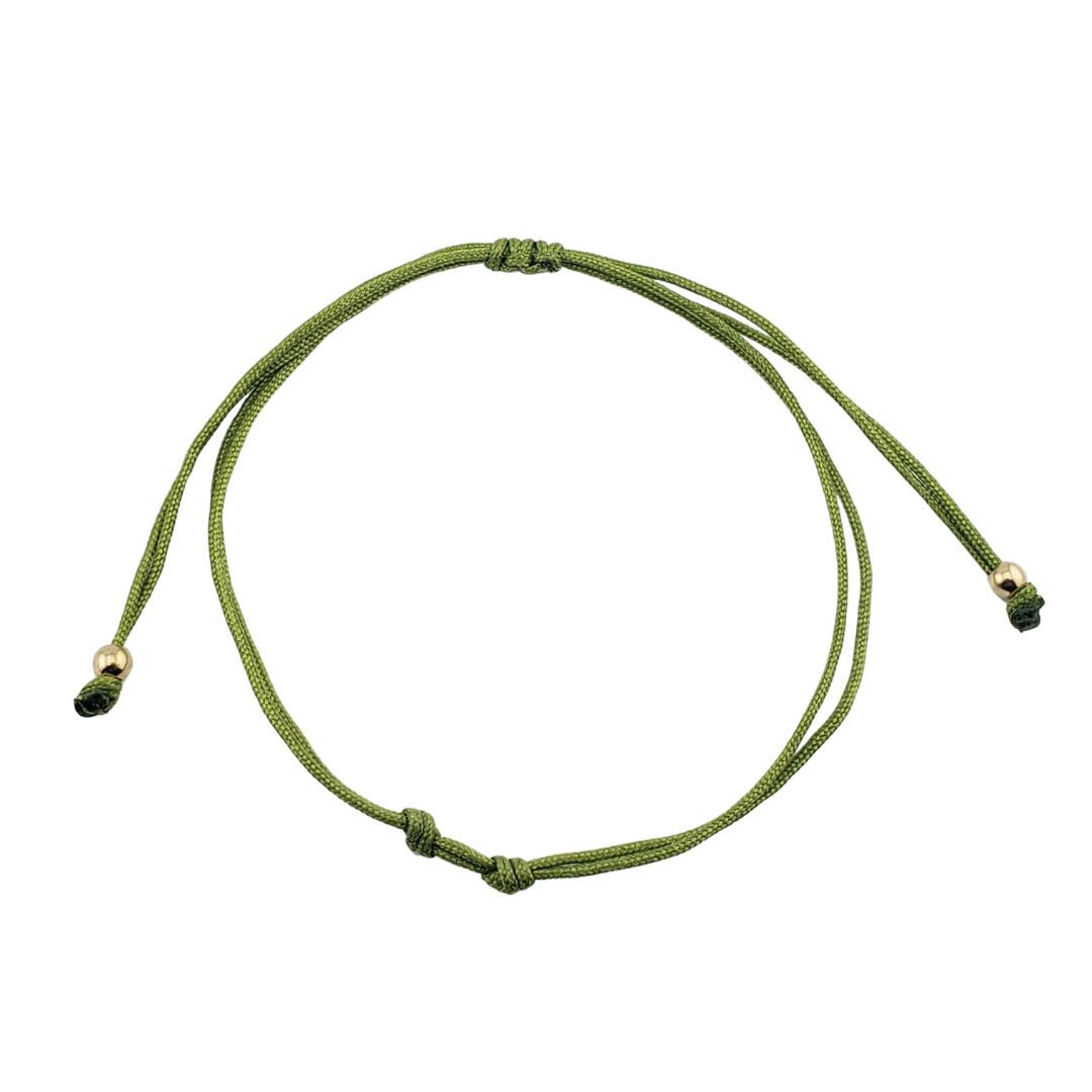 Pulseras hilos y 2 bolitas