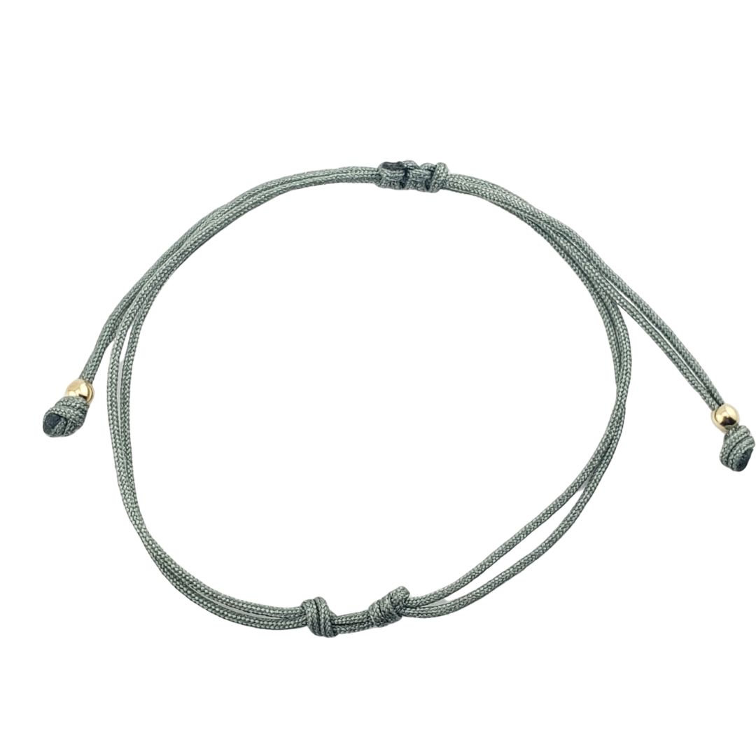 Pulseras hilos y 2 bolitas