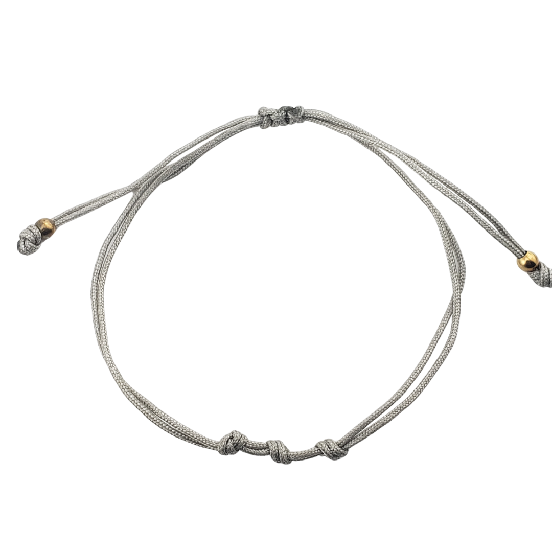 Pulseras hilos y 2 bolitas