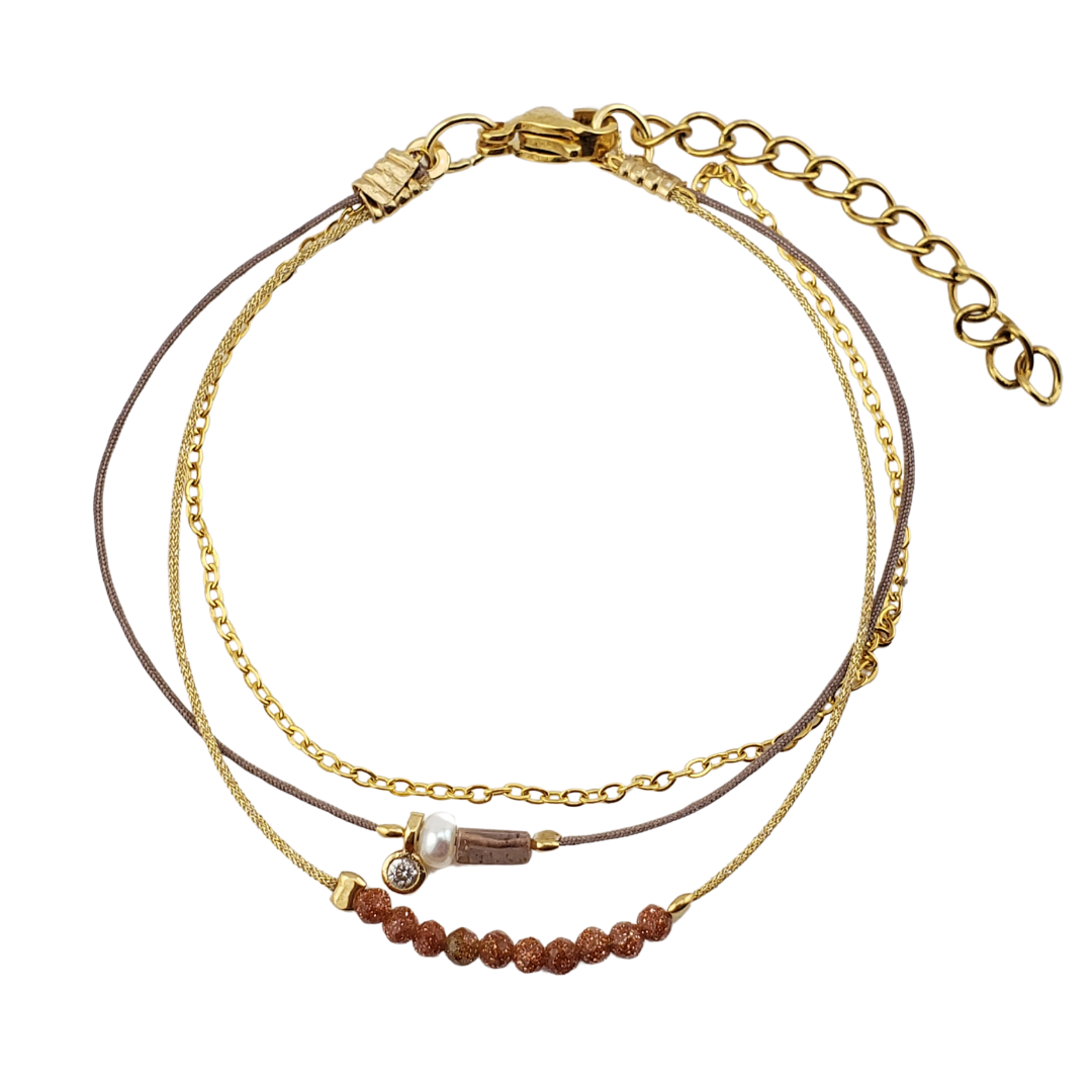 Pulsera triple cadena con 2 hilos.