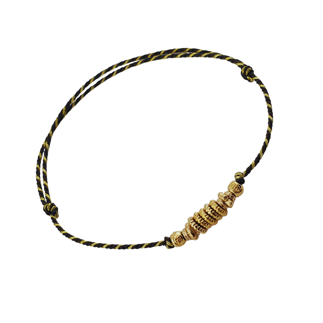 Pulsera hilos con barriles.