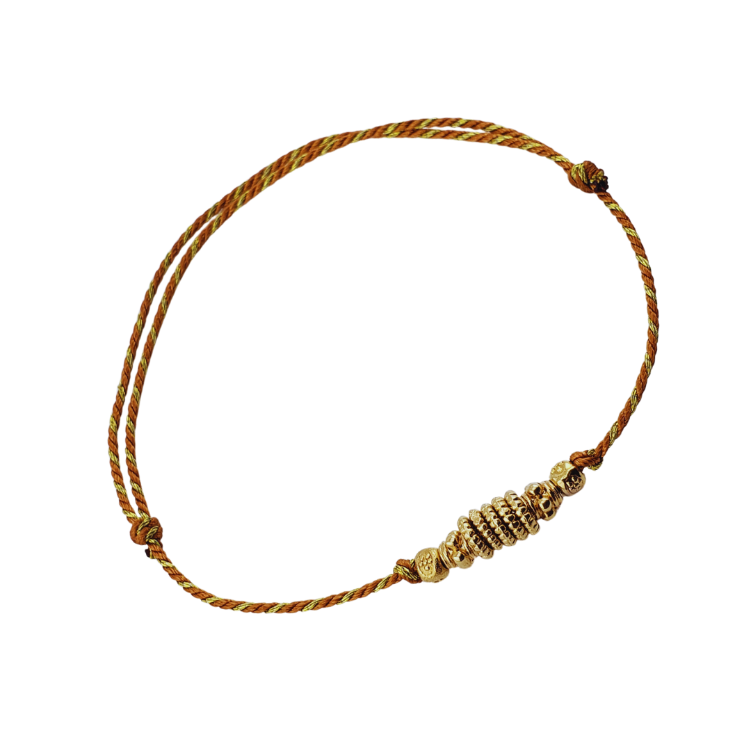 Pulsera hilos con barriles.