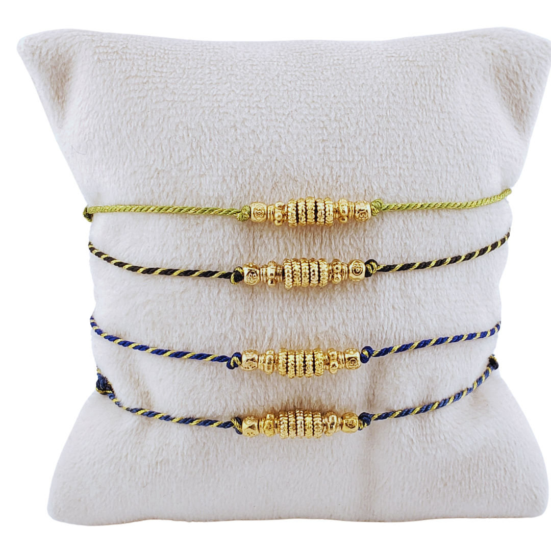 Pulsera hilos con barriles.