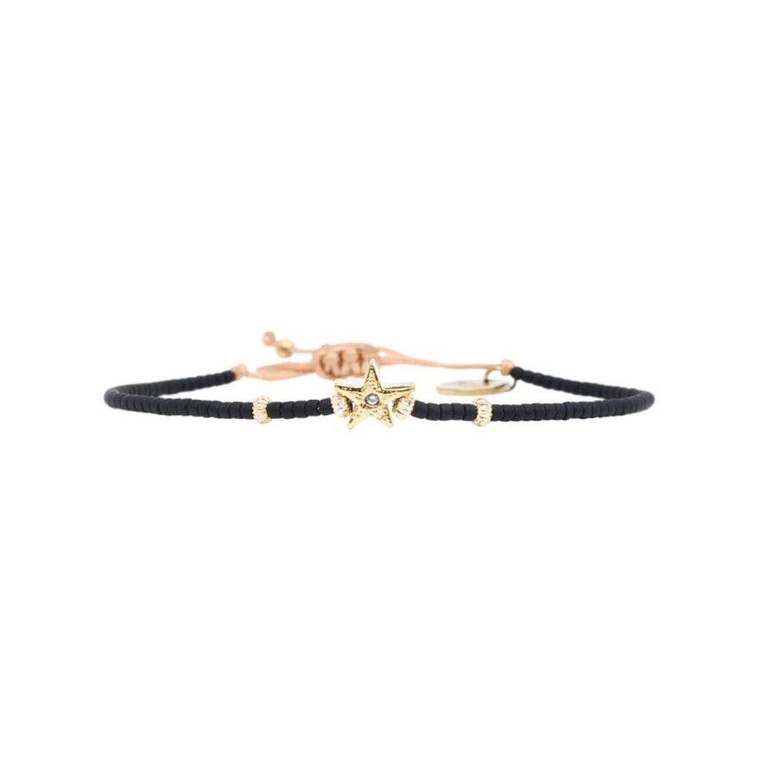 Pulseras negro y dorado