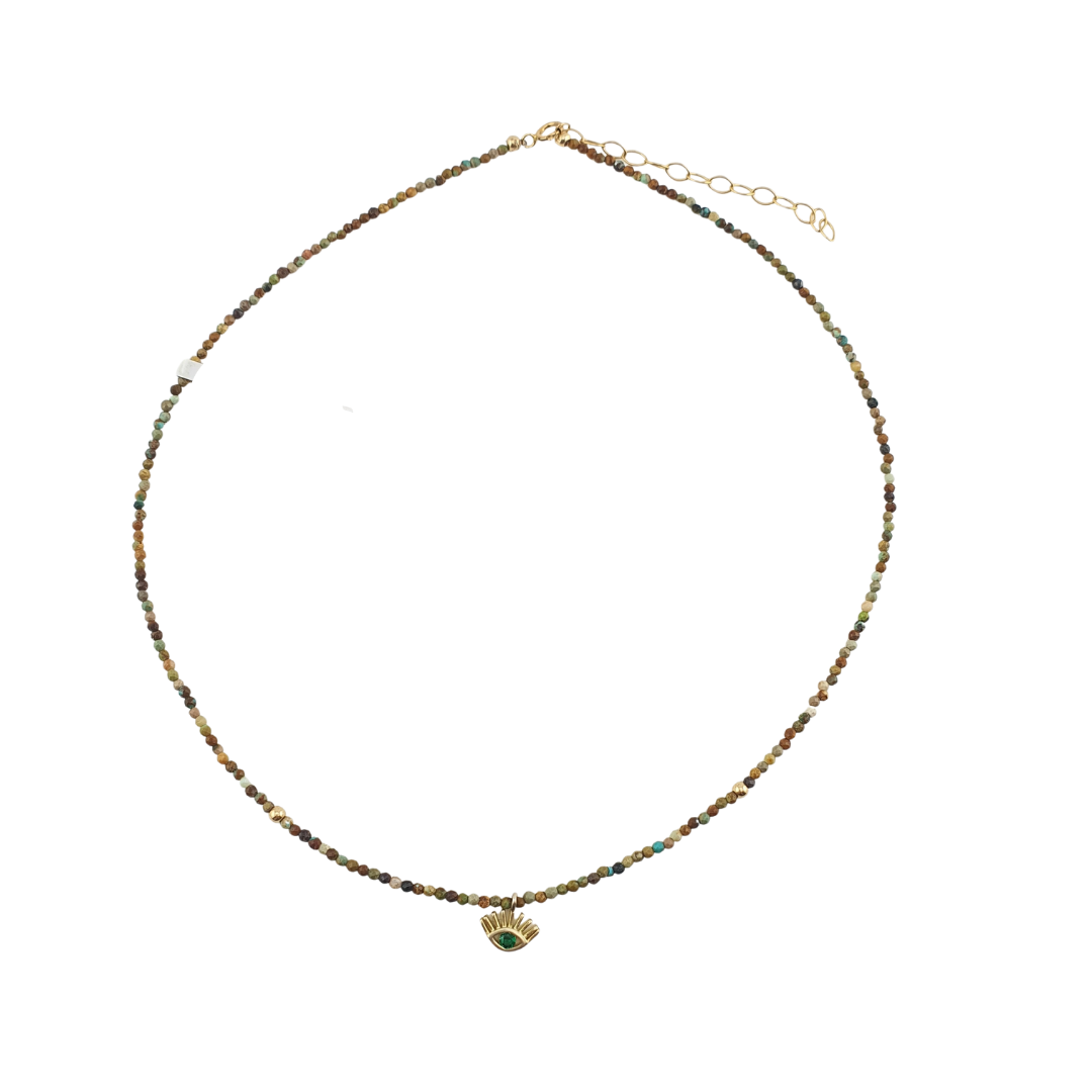 Collar turquesa africana tierra ojo