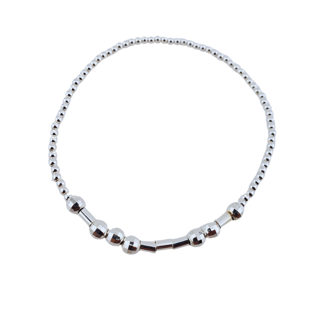 Pulsera bolitas barra torcida