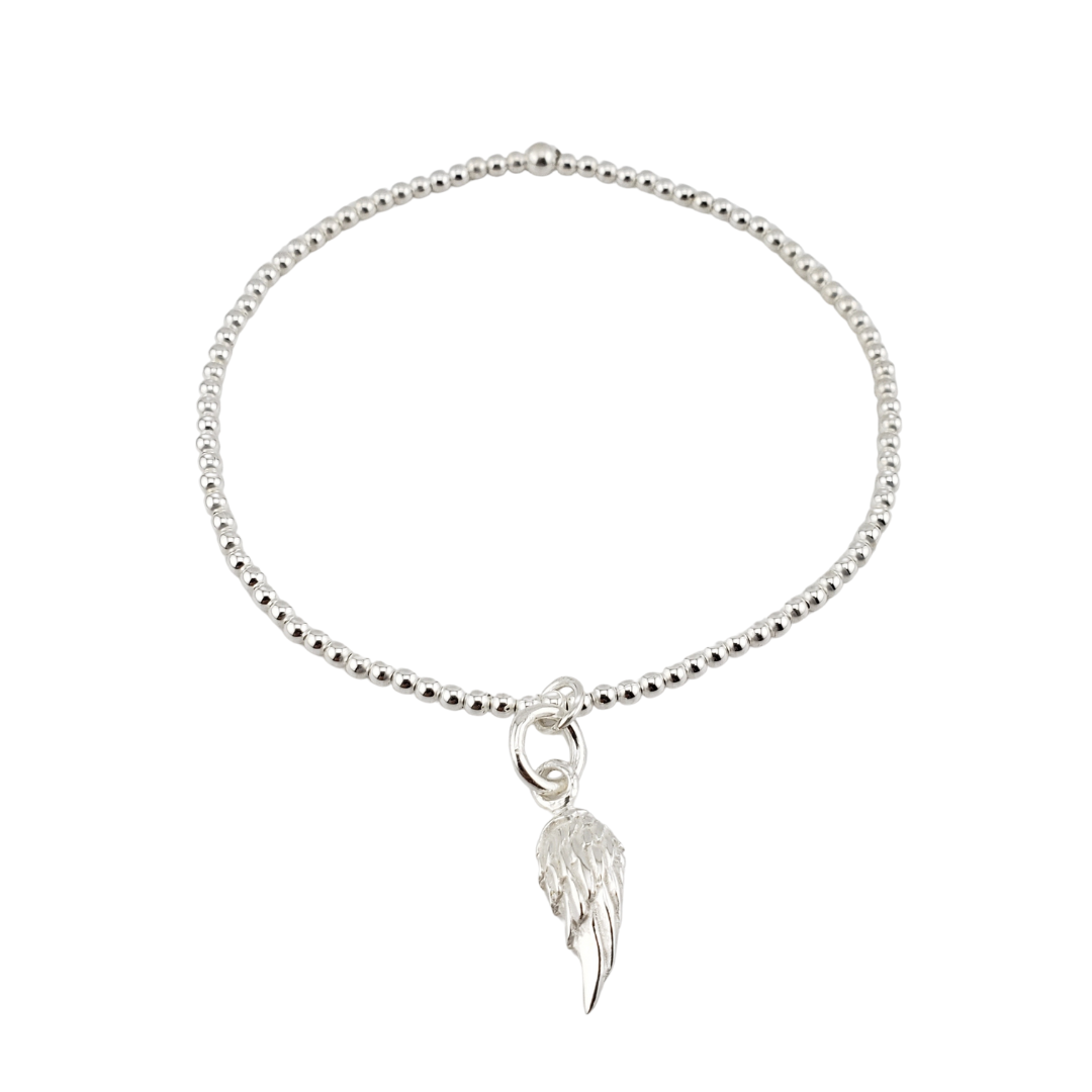 Pulsera bolitas alas