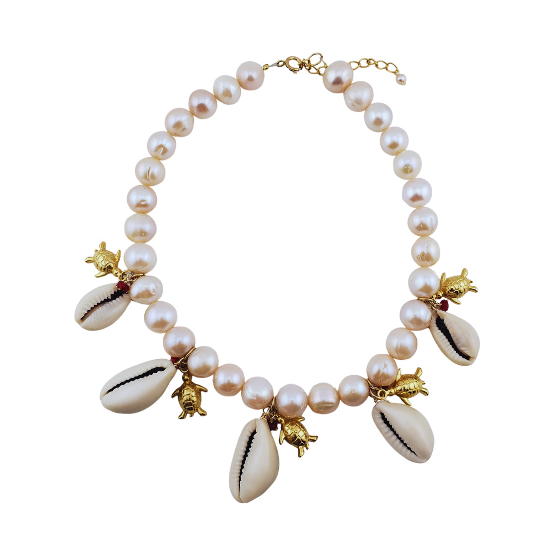 Collar perlas rosadas caracoles y tortugas