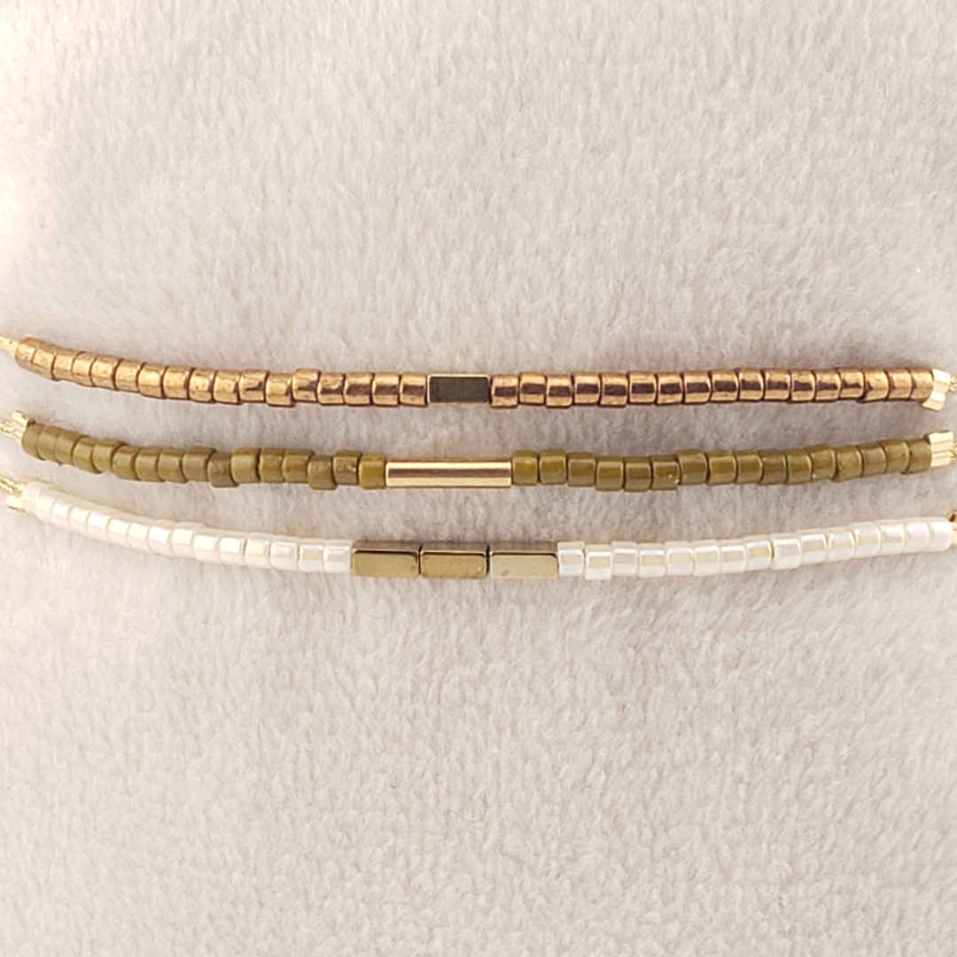 Pulsera triple hilo cristales.