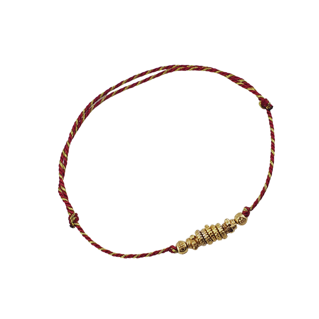 Pulsera hilos con barriles.