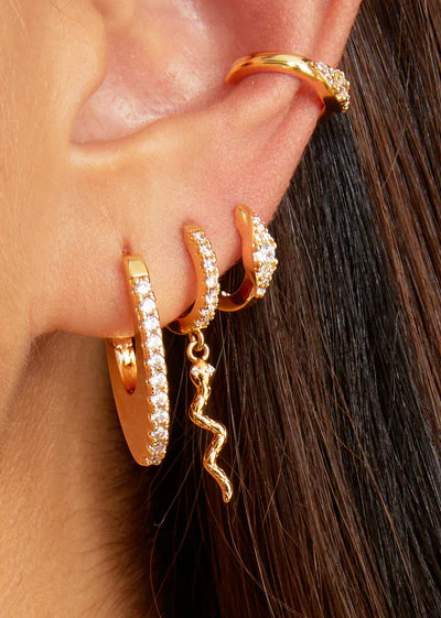 Arracada oval plana rellena linea circonias