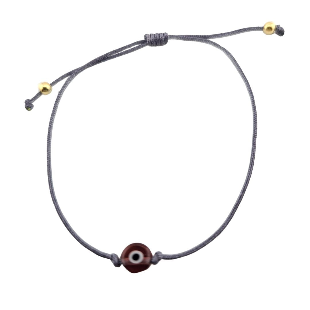 Pulsera con ojo de hilo ajustable