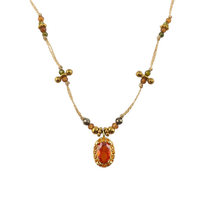 Collar hilo peridoto y granate hesonita y ovalo peridoto naranja