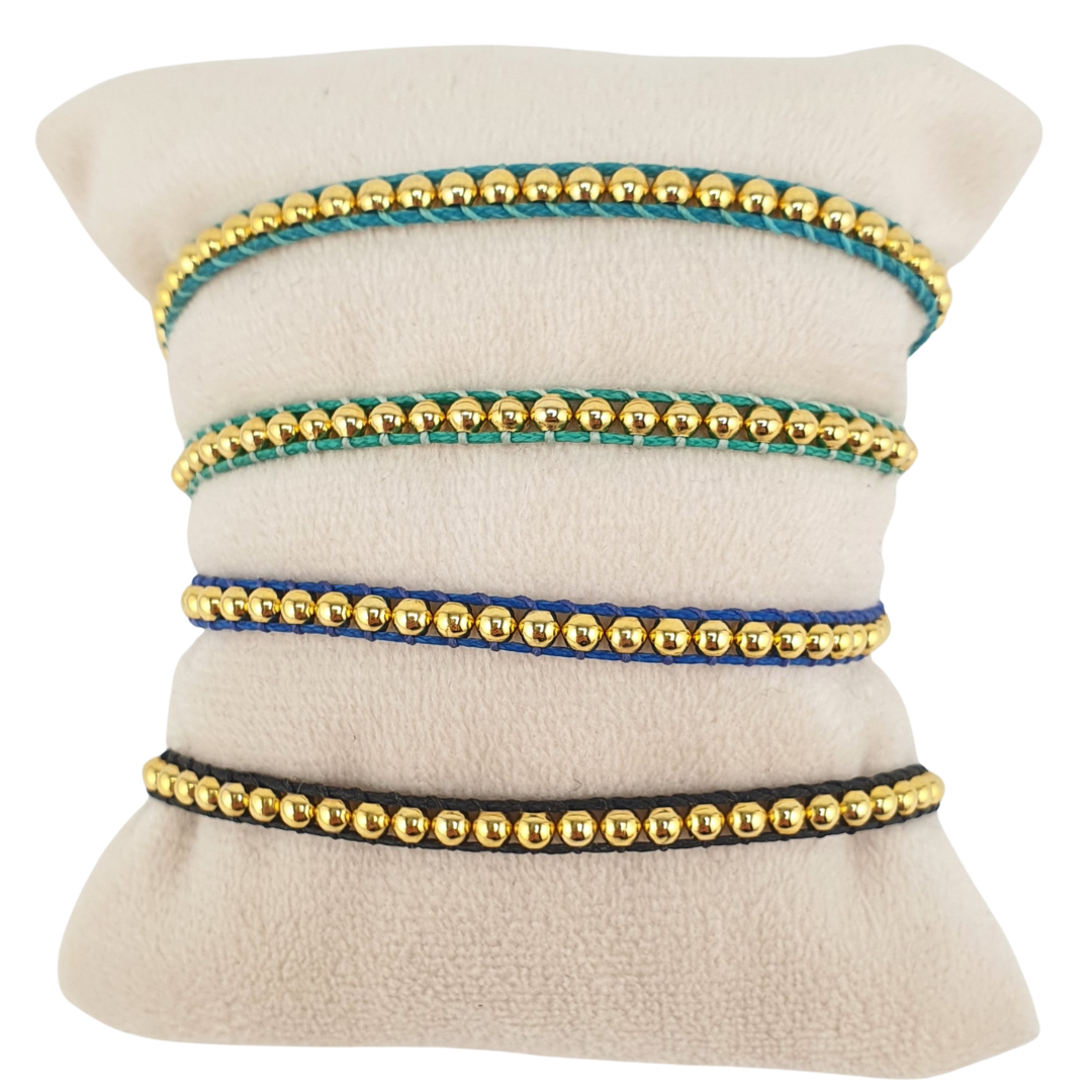 Pulsera tejida bolitas