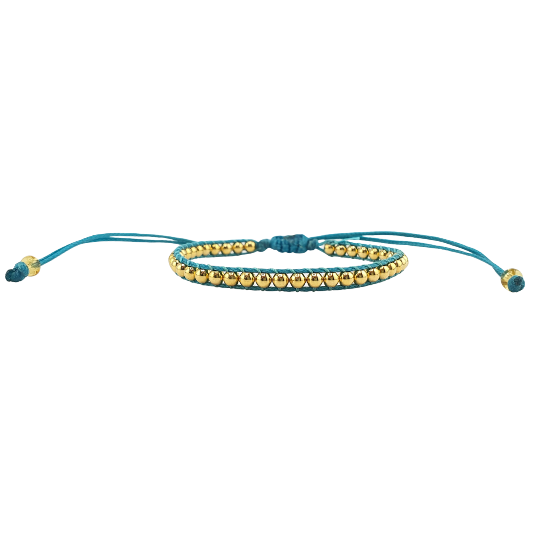 Pulsera tejida bolitas