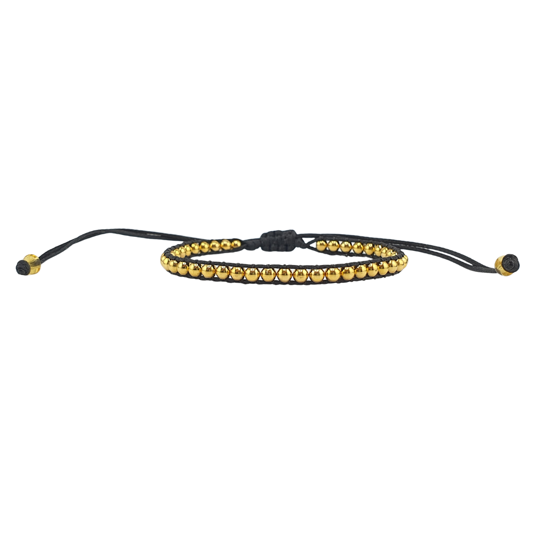 Pulsera tejida bolitas