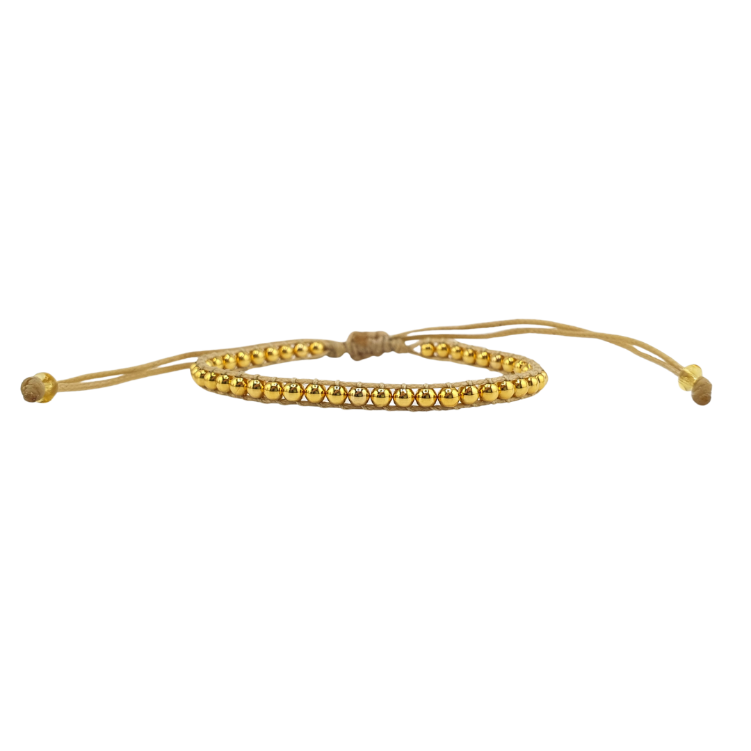 Pulsera tejida bolitas