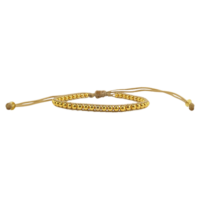 Pulsera tejida bolitas