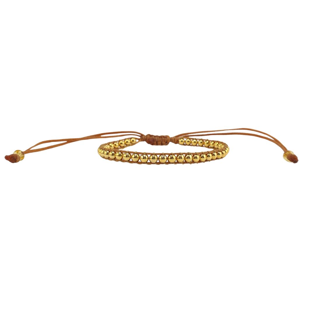 Pulsera tejida bolitas