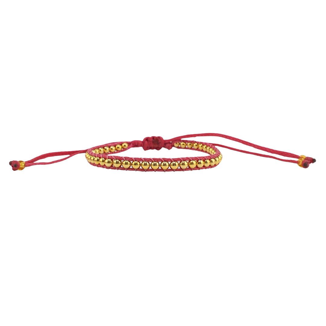 Pulsera tejida bolitas