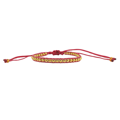 Pulsera tejida bolitas