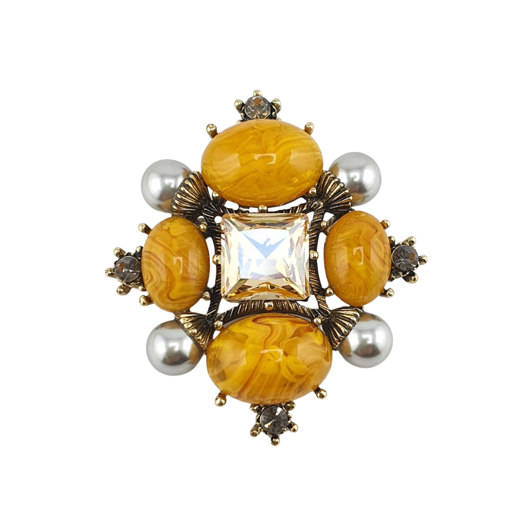 Broche cabujones