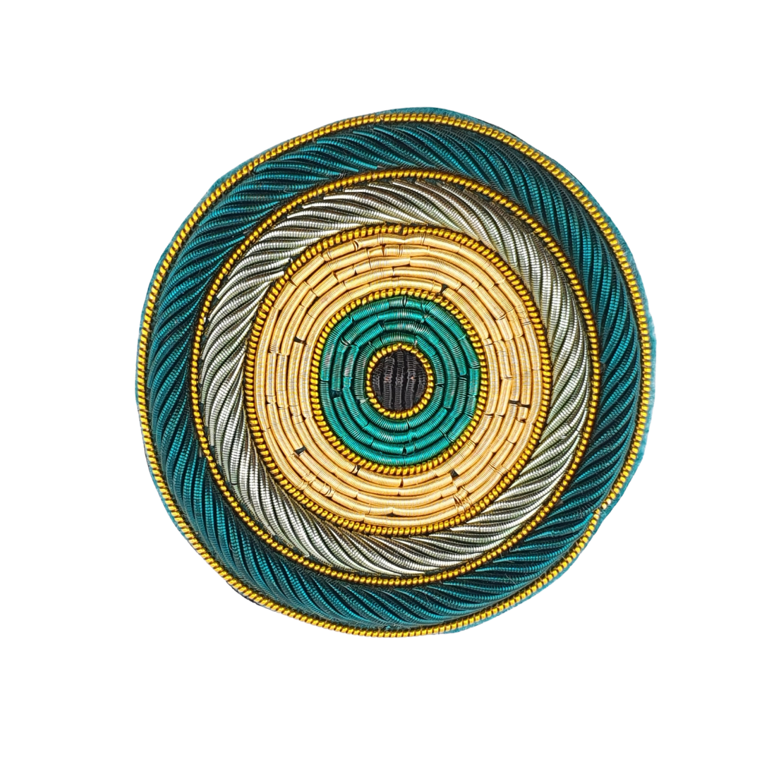 Broche tejido ojo
