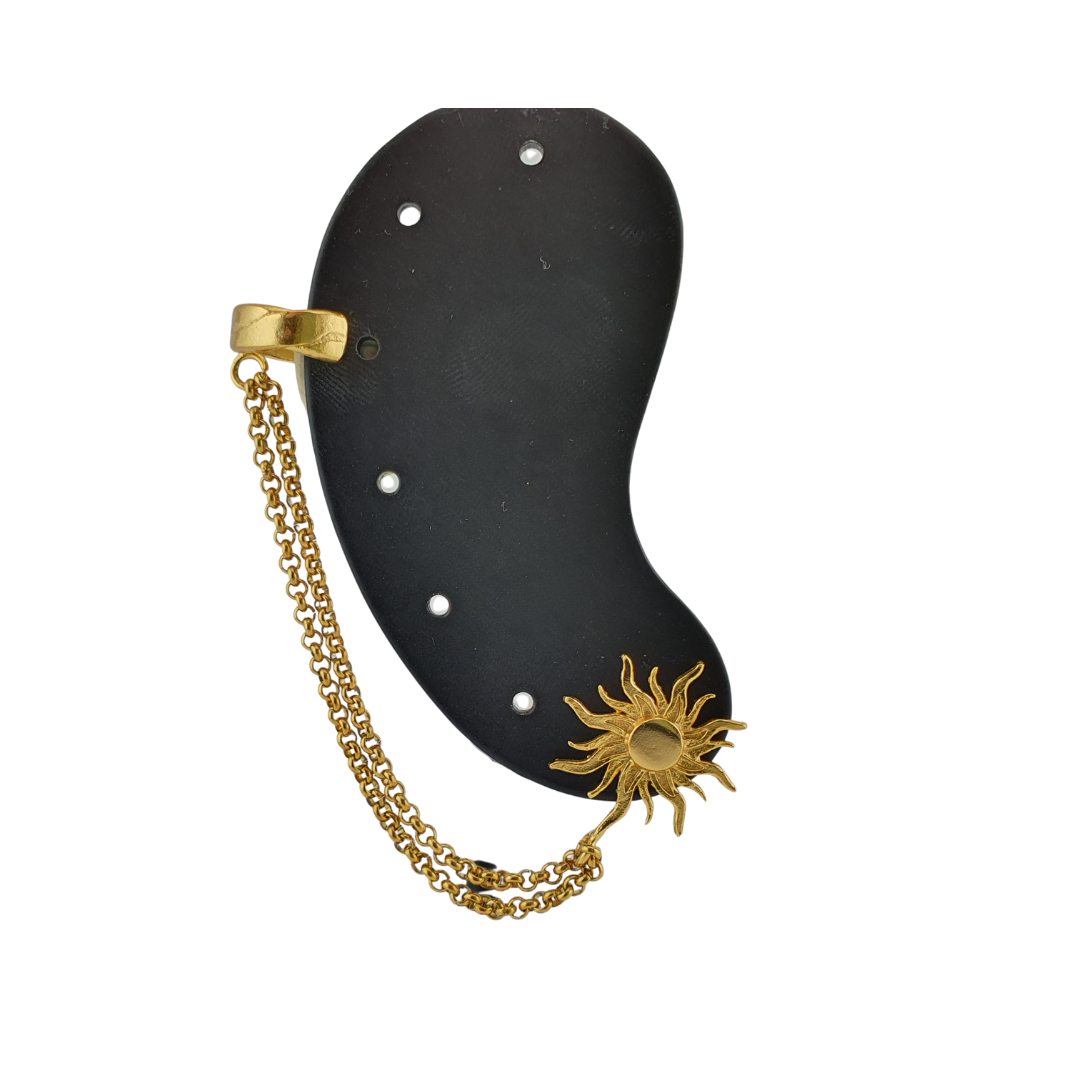 Cuff y arete sol cadena