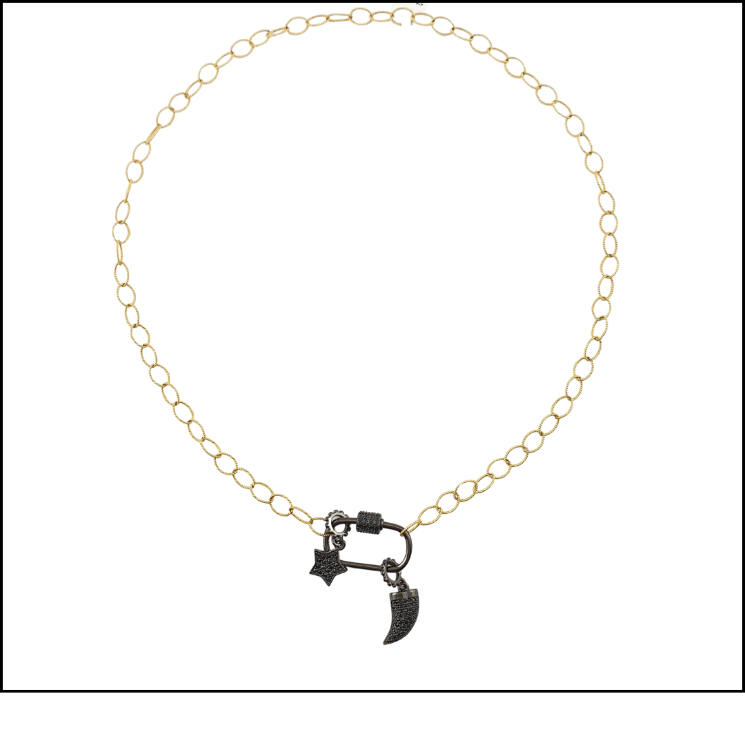 Cadena oval torcido con broche colmillo y estrella