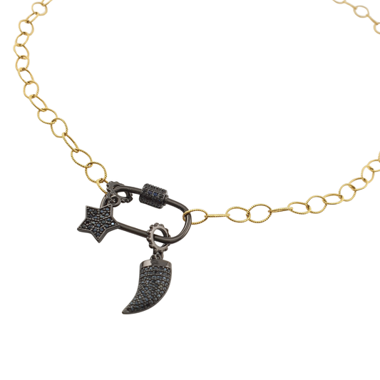 Cadena oval torcido con broche colmillo y estrella