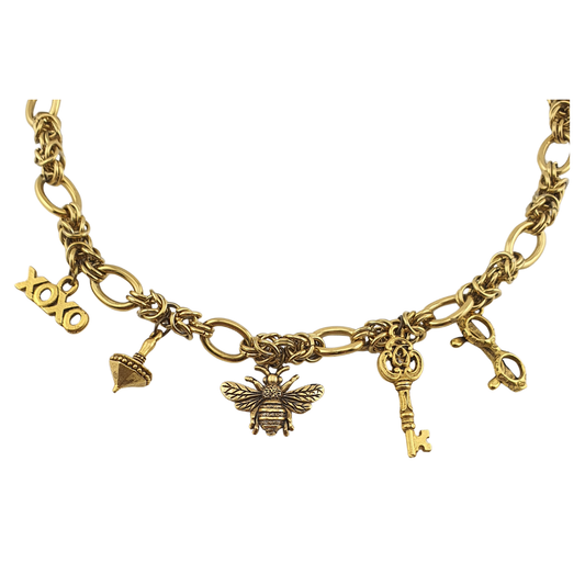 Cadena de oval, aros, racimo y 5 charms