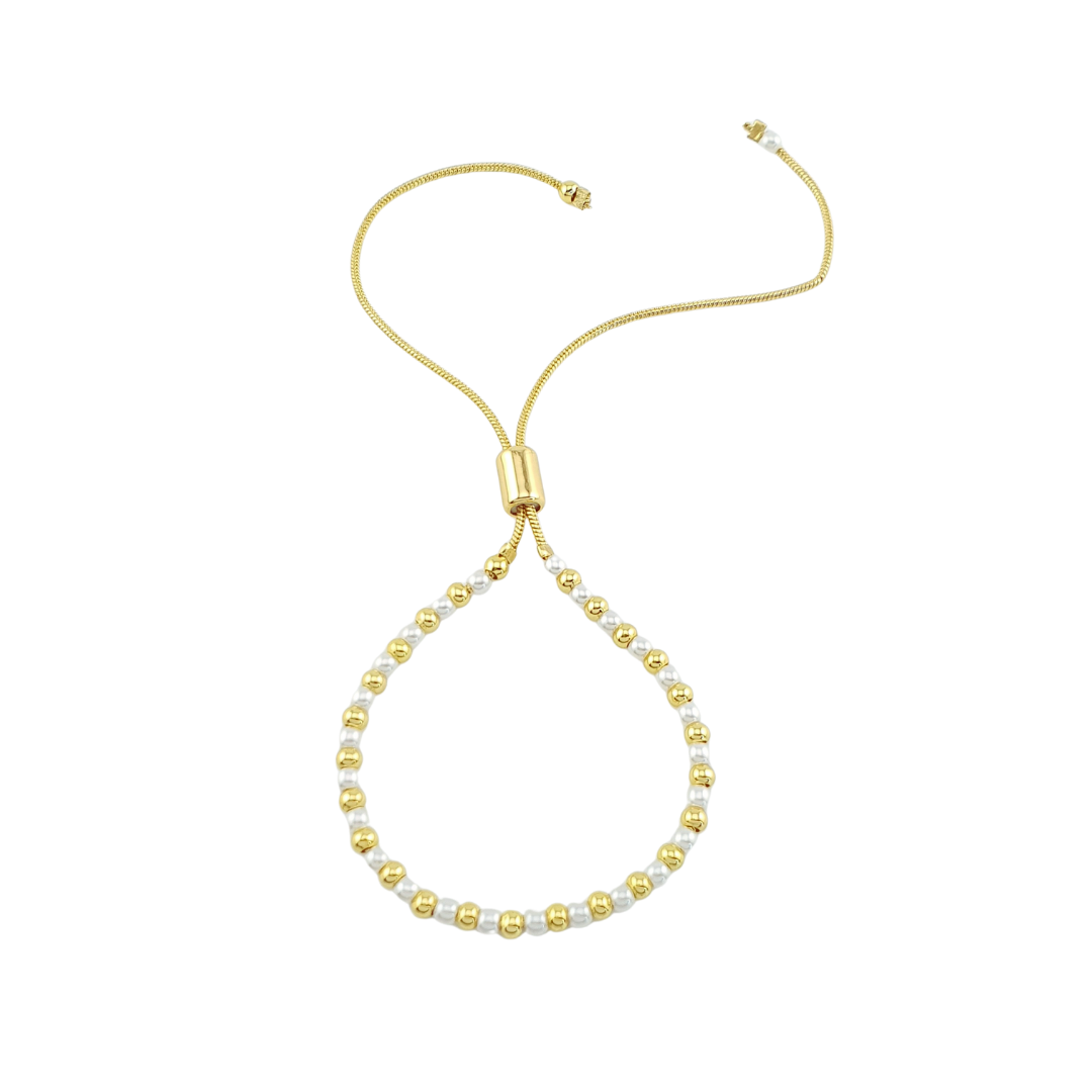 Pulsera de bolitas y perlas.
