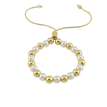 Pulsera de bolitas y perlas.