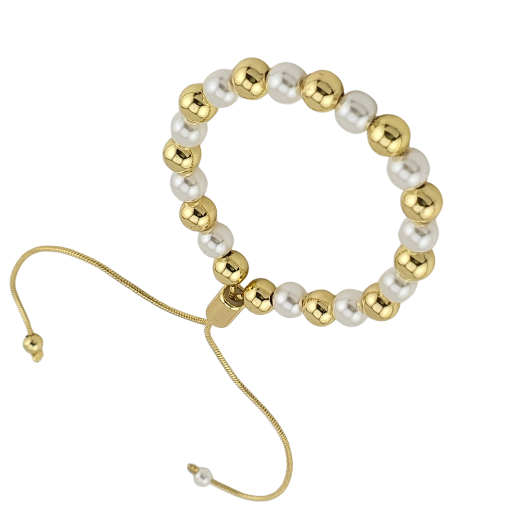 Pulsera de bolitas y perlas.