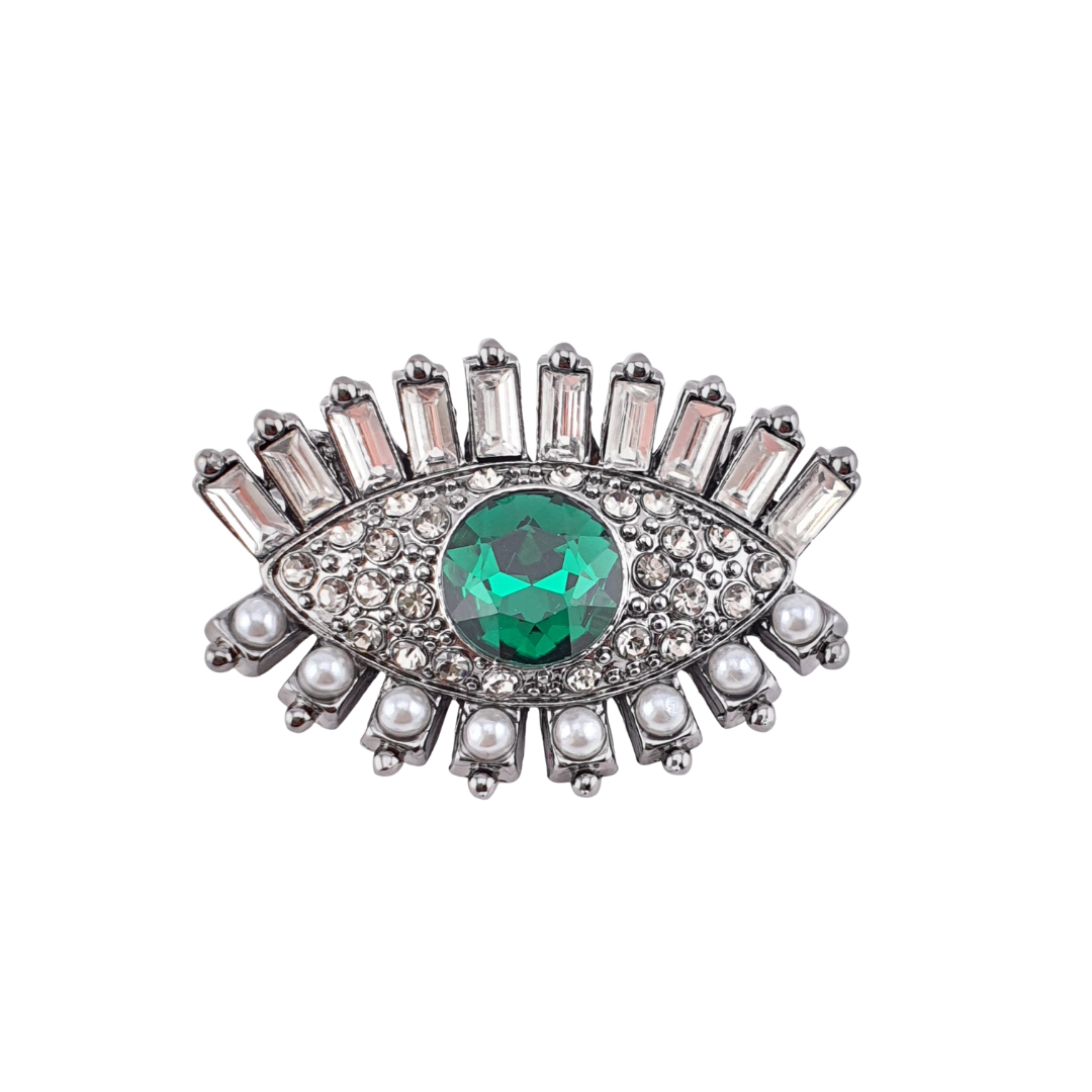 Broche ojo circonias perlas