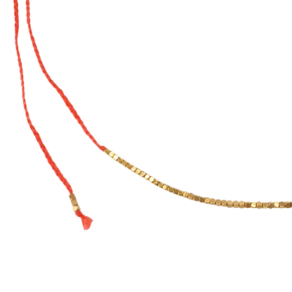 Collar hilo cubos y moneda centro