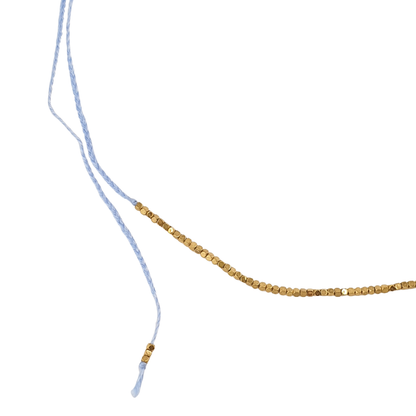 Collar hilo cubos y moneda centro